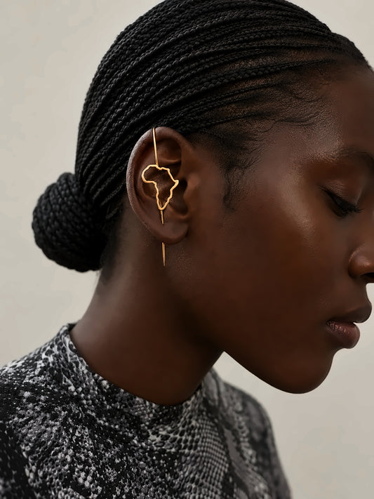 Boucle d'oreille Kemet en bronze doré, carte de l'Afrique portée le long de l'oreille